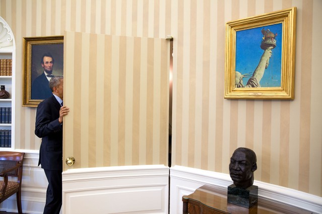 barack_obama_framed_by_a_bust_of_martin_luther_king_jr-_and_a_painting_of_abraham_lincoln